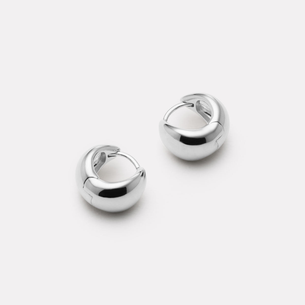 La Muse Huggie Earrings