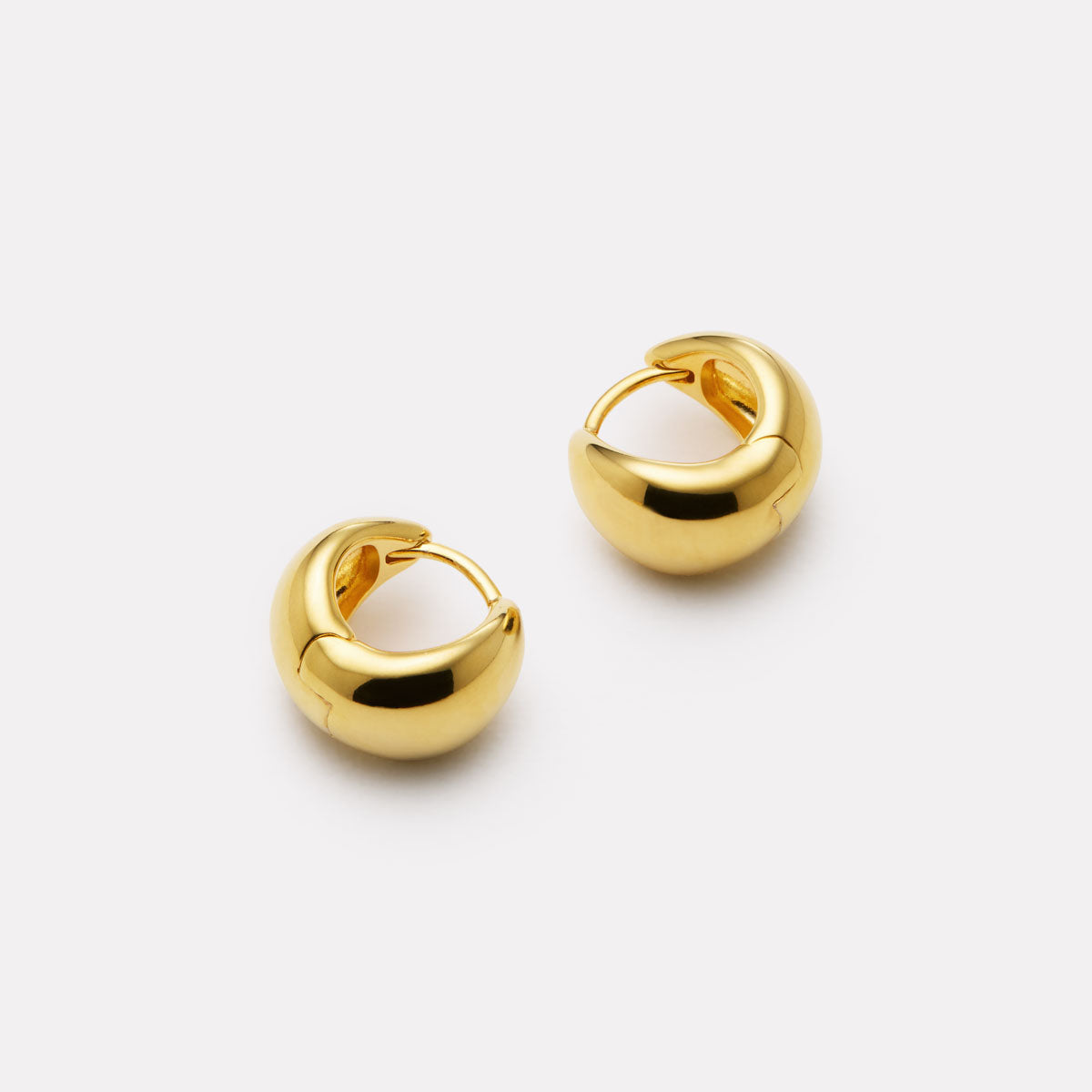 La Muse Huggie Earrings